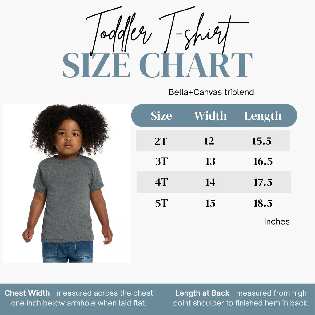 A toddler wearing a grey Future Activist Toddler Shirt by RainBee Designs LLC stands next to a size chart that lists measurements for sizes 2T through 5T in inches.