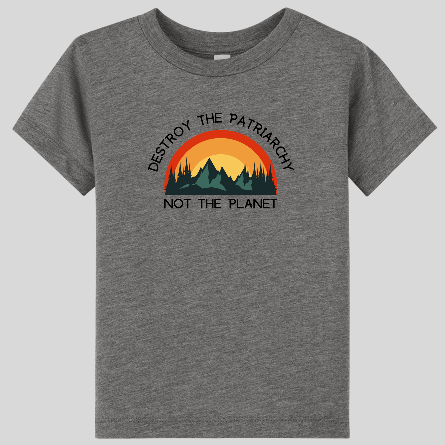 The Destroy the Patriarchy Toddler T-Shirt by RainBee Designs LLC is a heather grey toddler shirt showcasing a striking graphic of mountains and a sunset, with the statement “DESTROY THE PATRIARCHY NOT THE PLANET” printed above and below the design.
