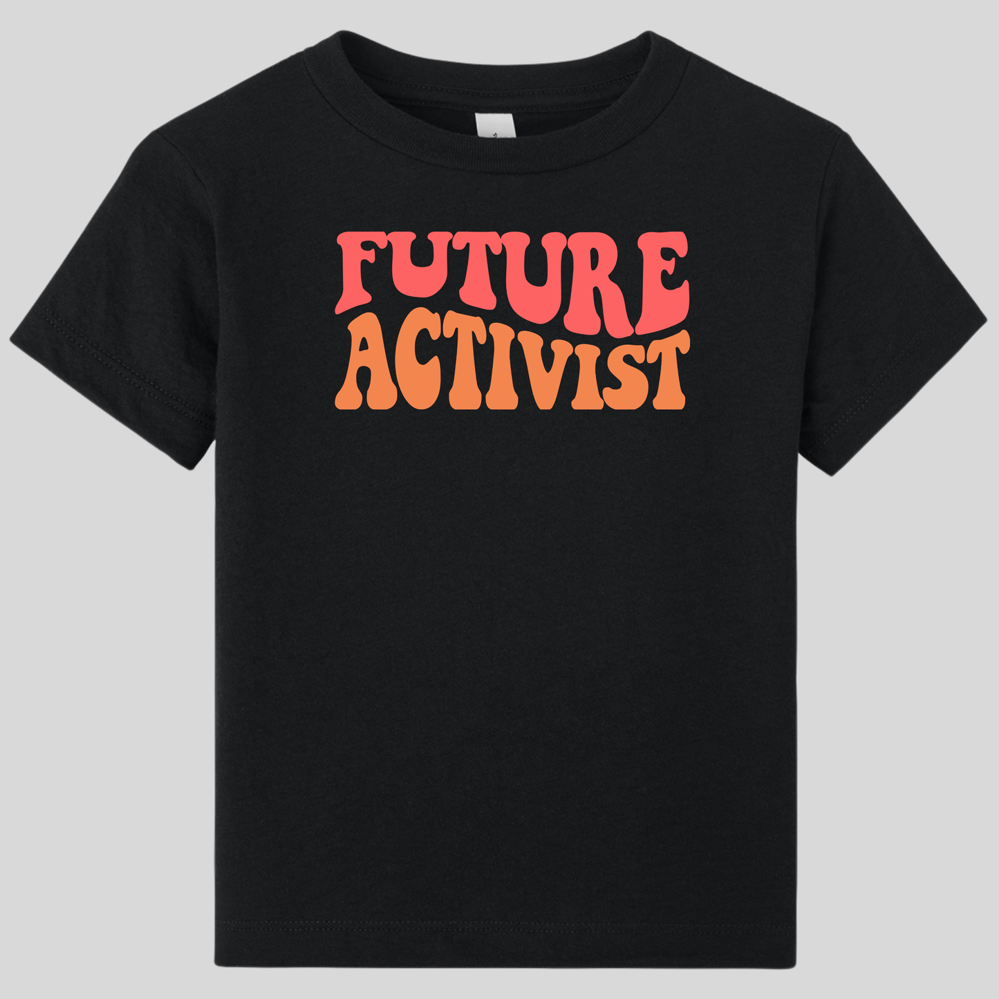 Introducing the Future Activist Toddler Shirt by RainBee Designs LLC—a standout black t-shirt featuring “FUTURE ACTIVIST” boldly printed on the front in retro-style orange and pink lettering. Part of our collection of kids' graphic tees, this shirt is perfect for young changemakers and ideal for children’s activist wear, inspiring the next generation of leaders.
