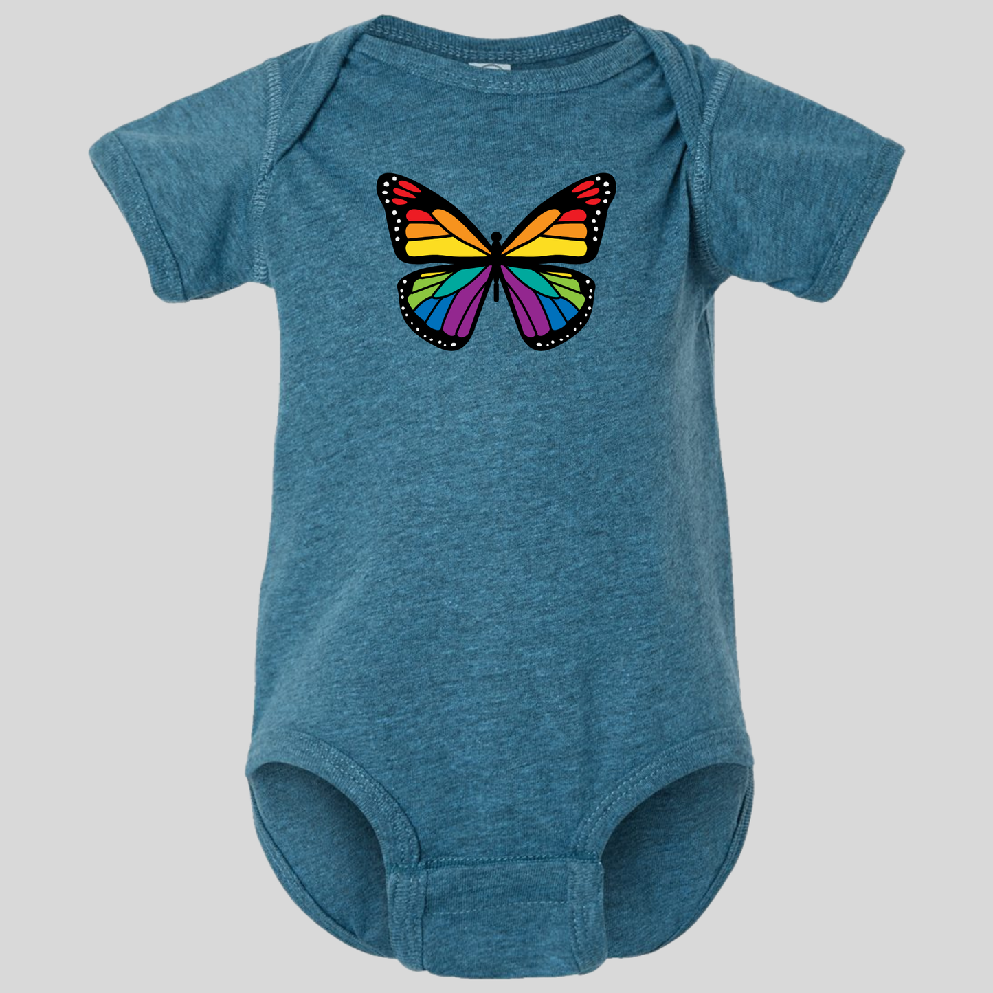 RainBee Designs LLC's Rainbow Butterfly Infant Onesie showcases a vibrant butterfly with rainbow-patterned wings on the chest, set against a soft blue fabric with a plain gray background.