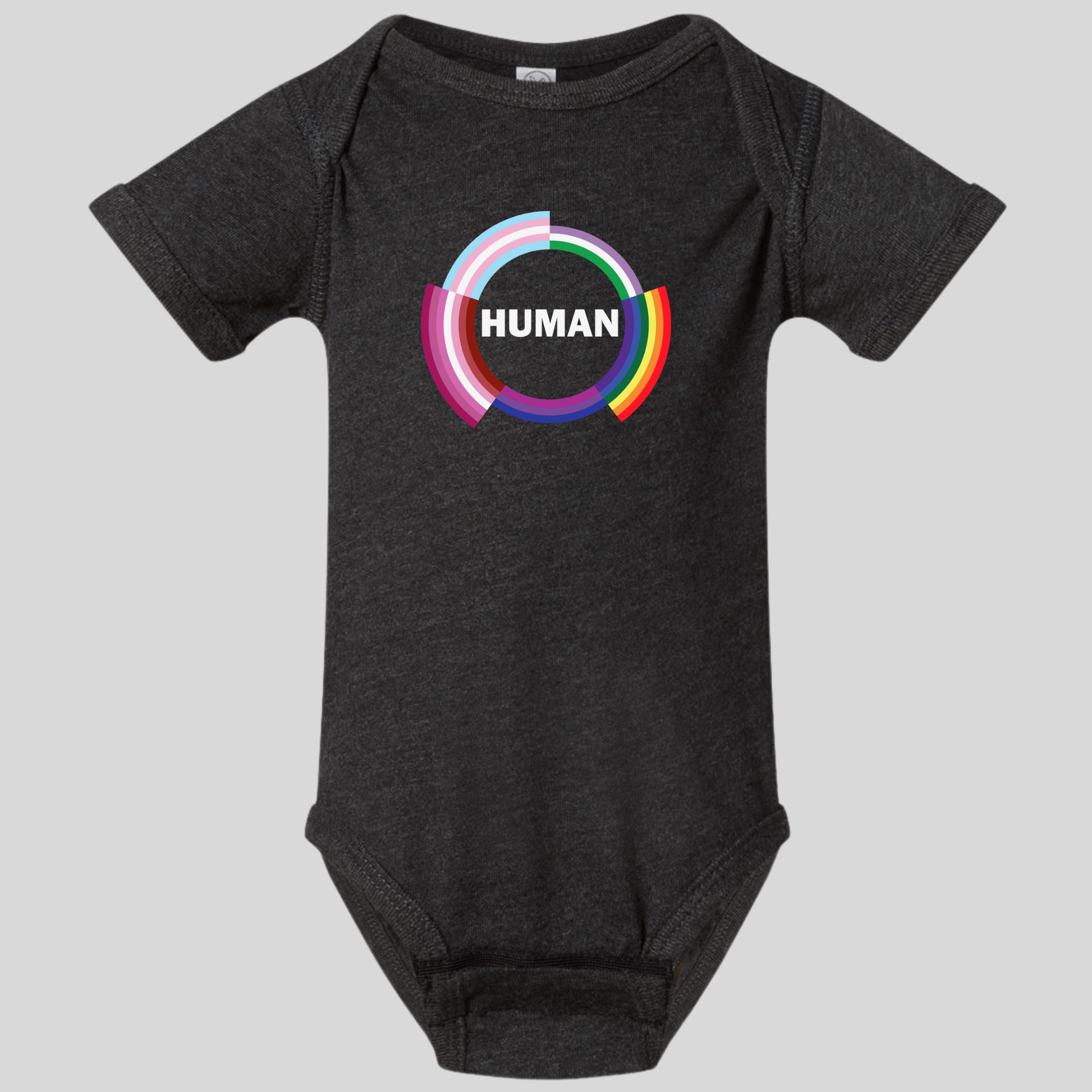 A dark gray Human Infant Onesie from RainBee Designs LLC, featuring a colorful circular design with the word HUMAN in bold white letters at the center, is displayed against a light gray background. This pride-inspired baby clothing piece combines comfort and vibrant style for your little one.