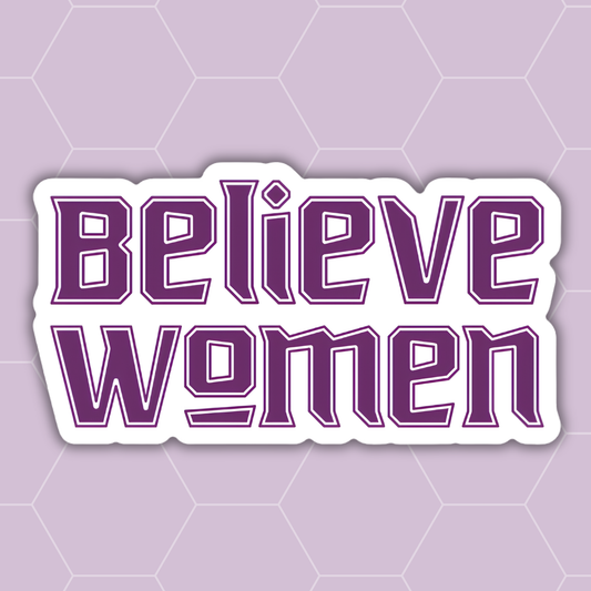 A die-cut vinyl sticker with the words 'Believe women' in purple varsity-style lettering with a white outline, shown against a light purple hexagonal patterned background.