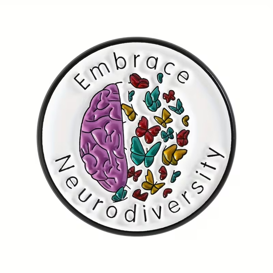 A circular white sticker or patch with a black border, featuring a split purple brain illustration and colorful butterflies, with the words 'Embrace Neurodiversity' written around it.