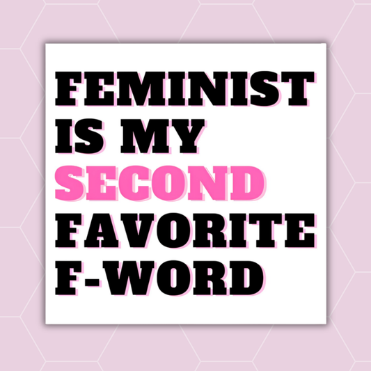 A square white sticker or print with bold black text outlined in pink reading 'FEMINIST IS MY SECOND FAVORITE F-WORD' on a light pink hexagonal background.
