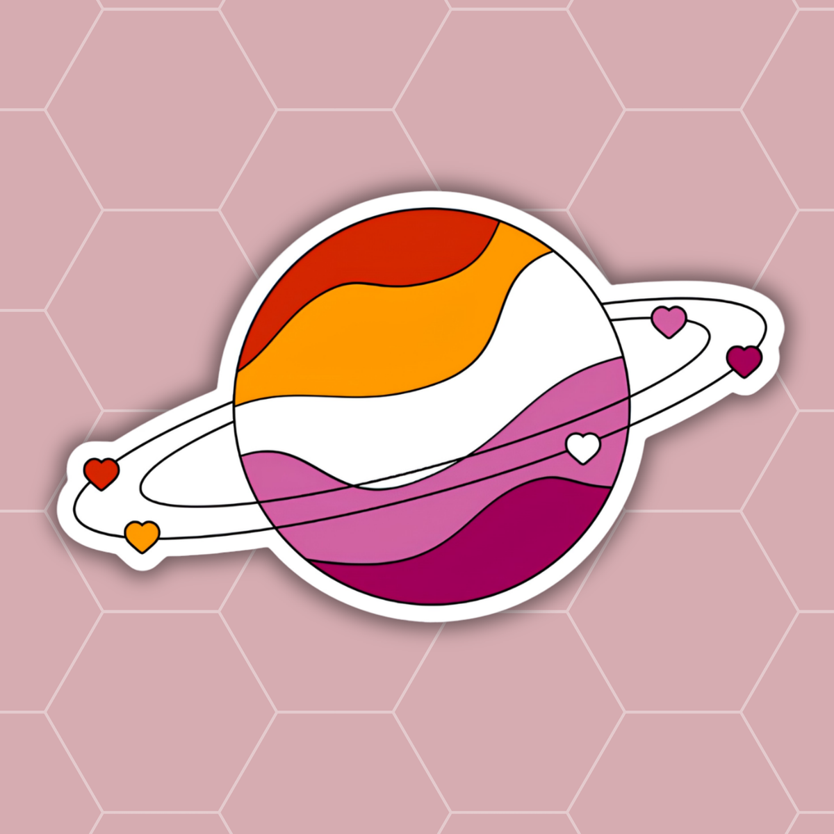 A die-cut vinyl sticker of a stylized Saturn-like planet with wavy stripes in red, orange, white, pink, and purple, accented with small hearts on its rings, shown on a dusty pink hexagonal patterned background.