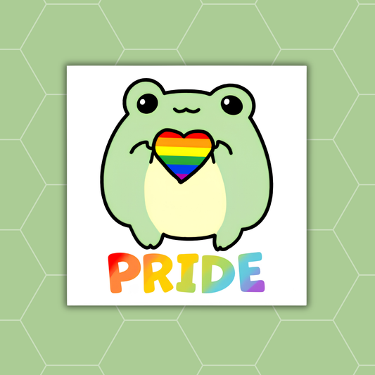 A square white sticker or card featuring a cute light green frog holding a rainbow-striped heart, with the word "PRIDE" in rainbow letters below, centered on a pale green hexagonal background.