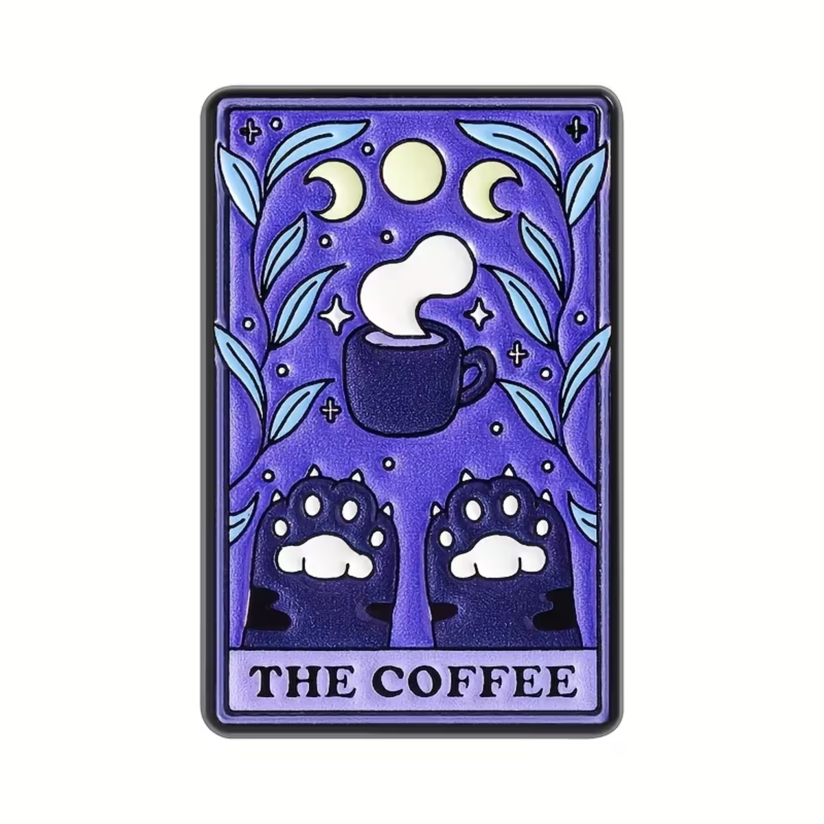 A rectangular enamel pin or sticker featuring a stylized tarot card design titled 'THE COFFEE'. The artwork shows a dark coffee cup with steam, crescent moons, stars, and two paw prints at the bottom, all on a purple background with light blue leaves.